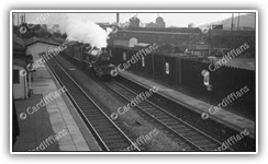 (1950s) South Wales Pullman passes by Ely Station (Cowbridge Road in background)