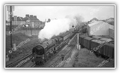 (1957) Locomotive Britannia 70028 Royal Star heads west through Ely Mill