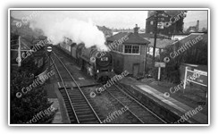 (1960s) Locomotive Britannia A58 passing Ely Signal Box (Rhymney and Crosswells Brewery in background)